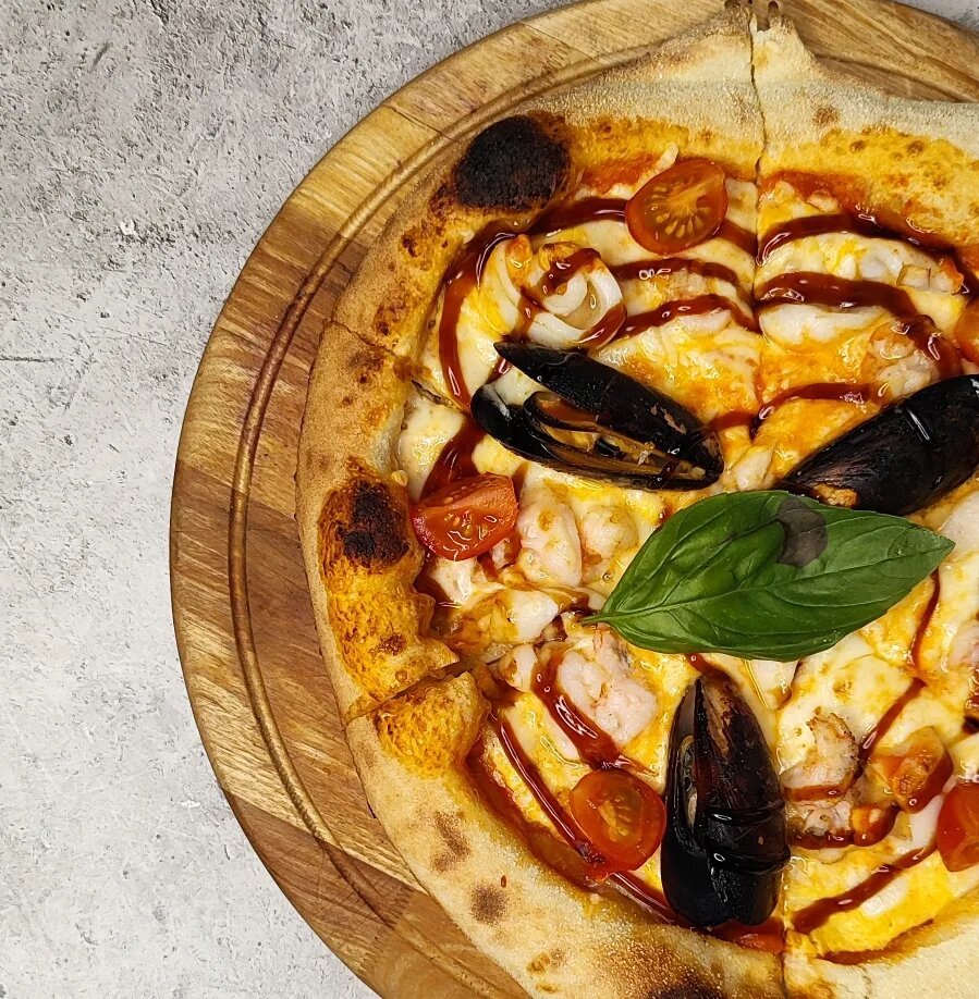 Пицца с морепродуктами (1320 руб.), ресторан Porta Rossa 