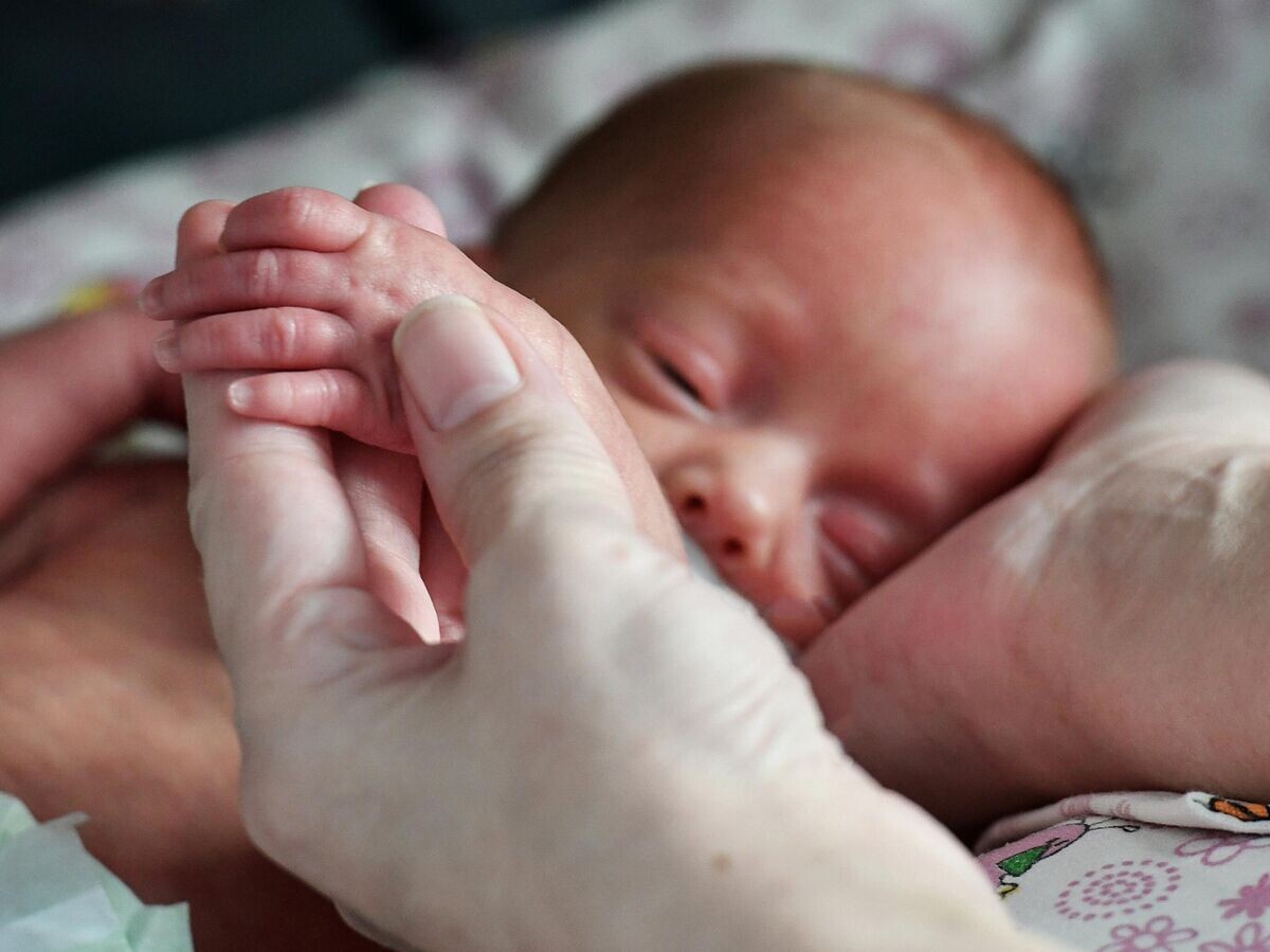    Новорожденный ребенок | © РИА Новости / Георгий Зимарев