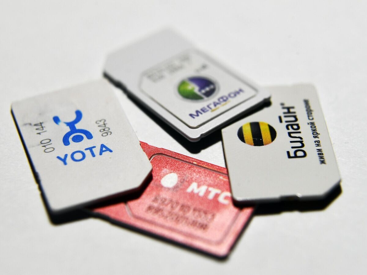    СИМ-карты сотовых операторов мобильной связи "Билайн", "Мегафон", МТС и Yota© РИА Новости . Александр Кряжев
