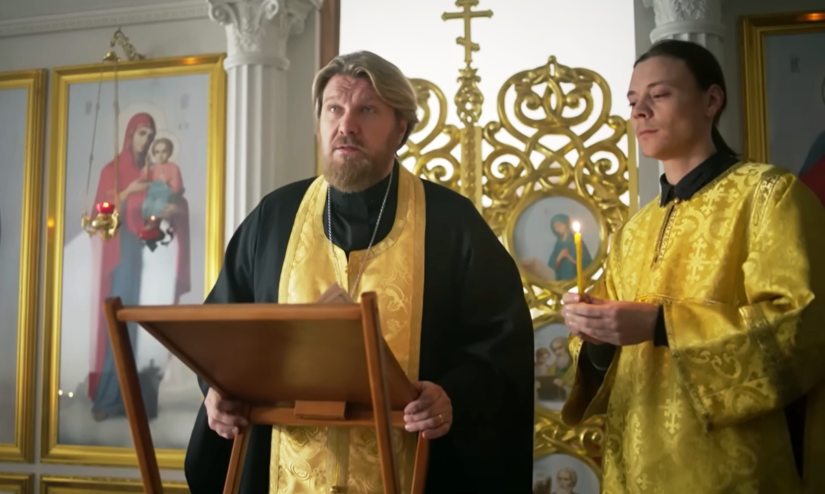 Отец Александр и алтарник Эдик.