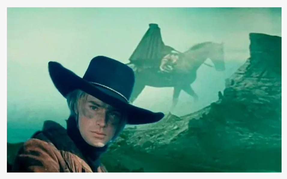 Морис Джеральд (Олег Борисович Видов — советский, российский и американский киноактёр, кинорежиссёр, сценарист, продюсер, предприниматель. Годы жизни 11.06.1943-15.05.2017, похоронен в Голливуде)