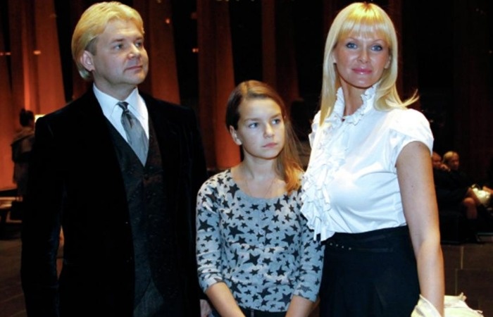 Андрис Лиепа и Екатерина Катковская с дочерью.