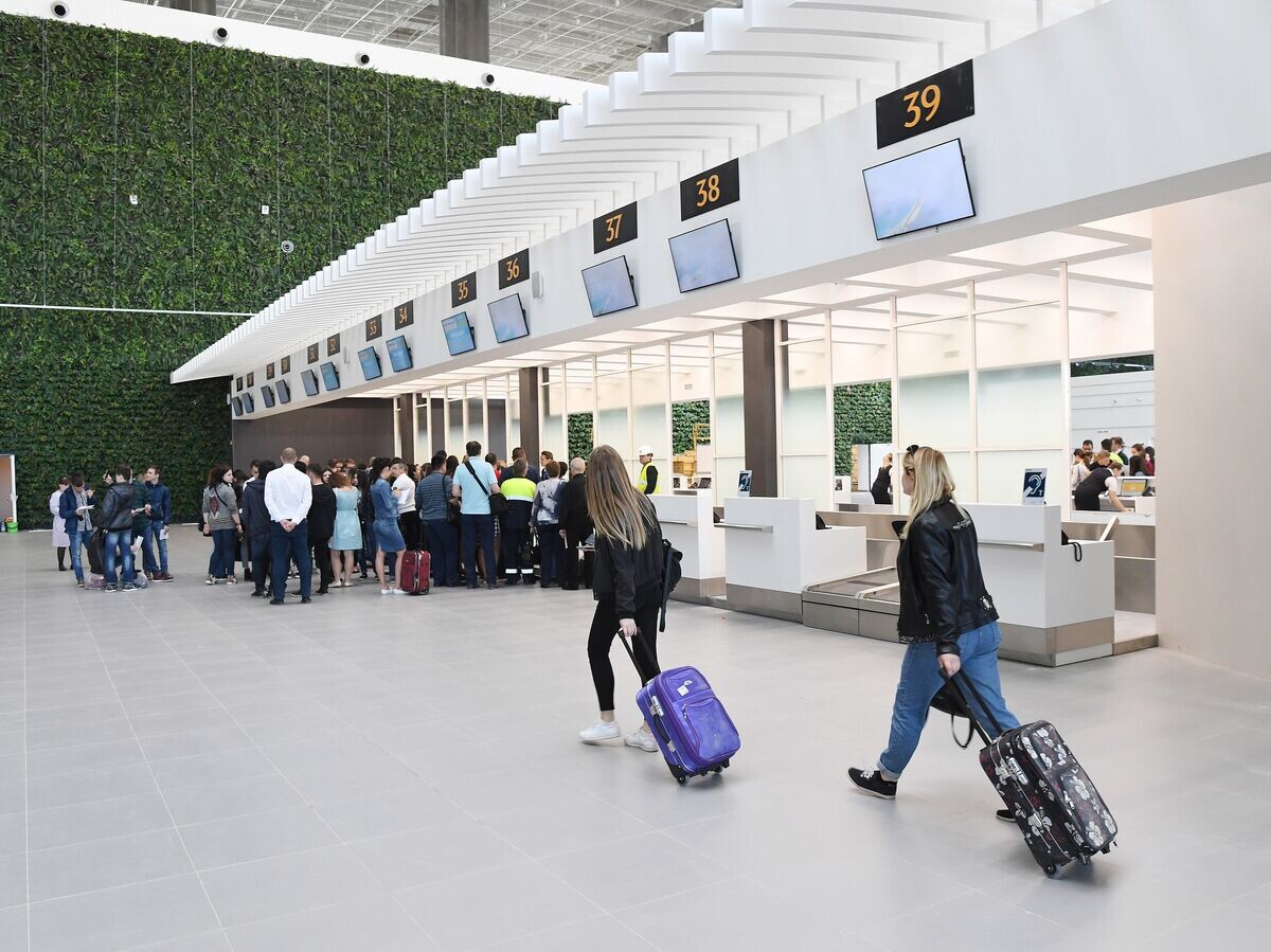    Работа нового терминала аэропорта в Симферополе© РИА Новости . Александр Полегенько