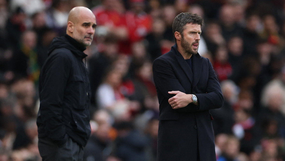    Хосеп Гвардиола и Майкл Кэррик. Reuters