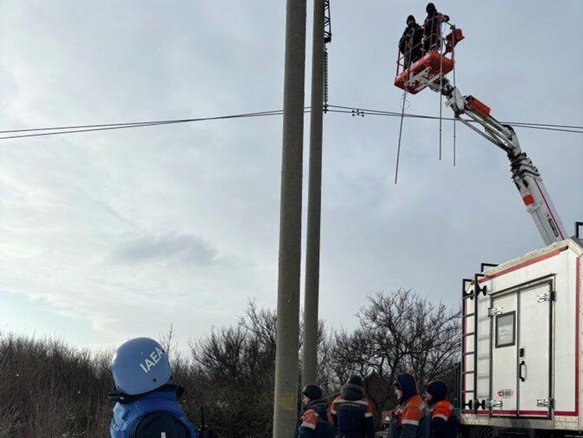    Ремонтные работы на резервной ЛЭП для снабжения ЗАЭС | © Фото : IAEA/X