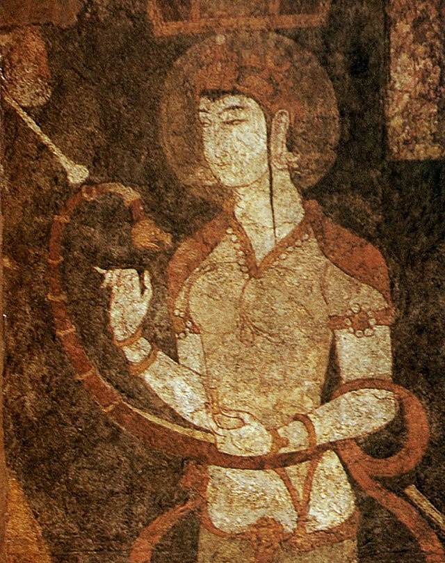 «Женская фигура, играющая на смычковой арфе», Согдиана. Фото является общественным достоянием.