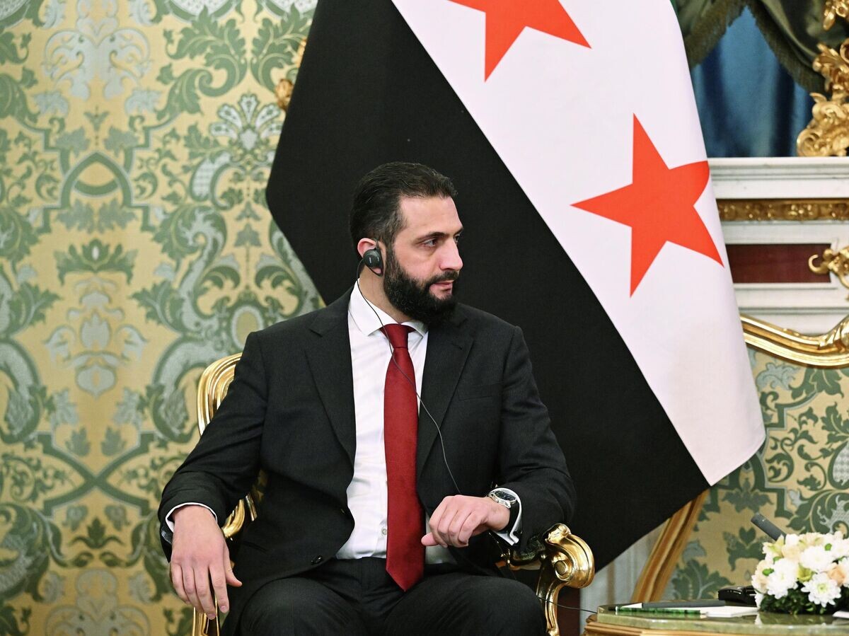    Президент Сирии Ахмед аш-Шараа во время встречи в Москве с президентом РФ Владимиром Путиным | © РИА Новости / Сергей Бобылев