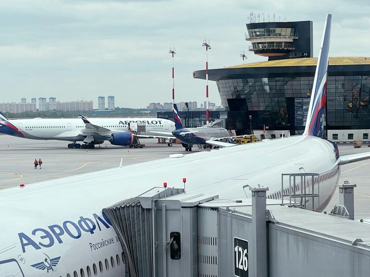    Самолет Boeing 777-300 авиакомпании "Аэрофлот" в международном аэропорту Шереметьево | © РИА Новости / Наталья Селиверстова