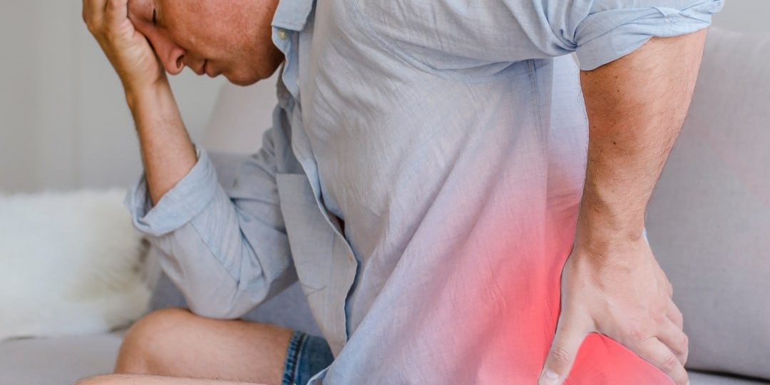 Боль внизу спины — универсальный симптом