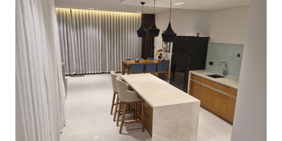 Spacious Kitchen and Dining Area with Island Seating