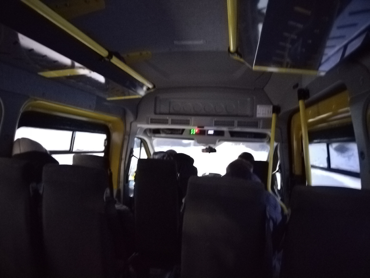 В микроавтобусе.