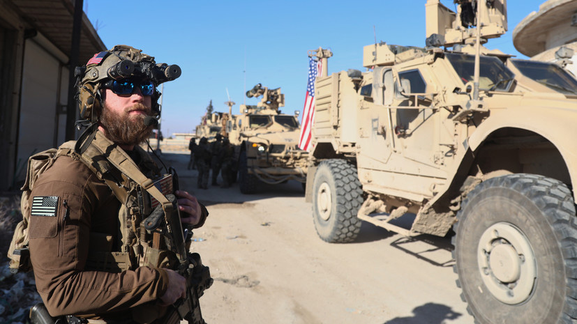     An American soldiers from the U.S.-led coalition against the Islamic State group stands guard during a meeting with the U.S.-backed Syrian Democratic Forces in Deir Hafer, Syria, Friday, Jan. 16, 2026 AP Baderkhan Ahmad