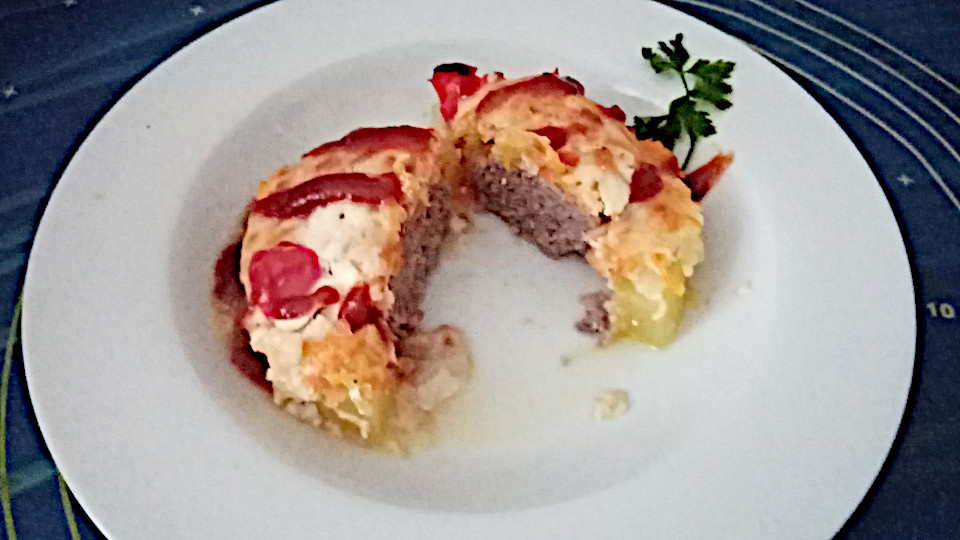 Кружочек кабачка, наполненный фаршем и запеченный в духовке