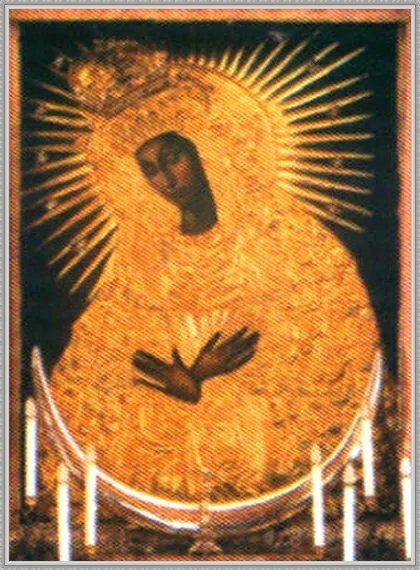 Икона Богородицы в лучах славы  фото из свободного источника