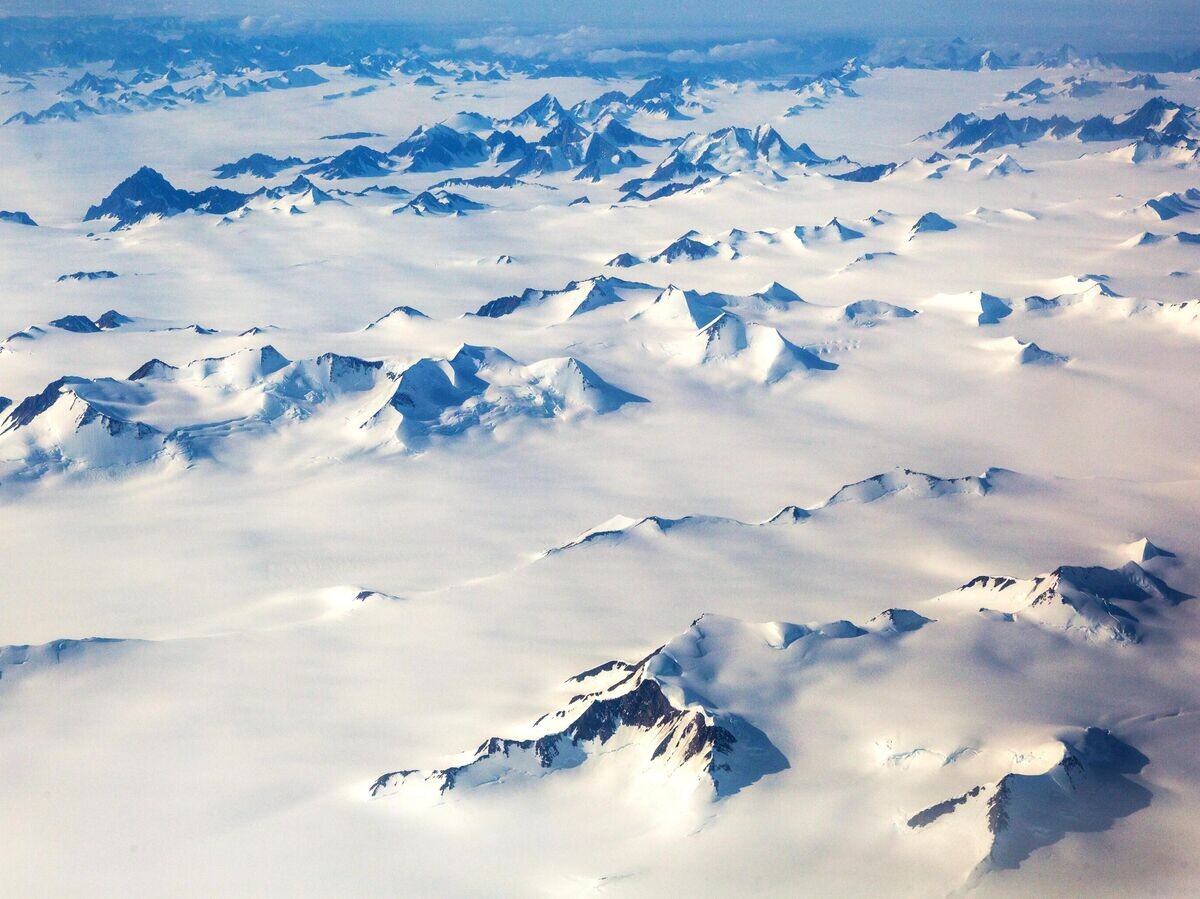    Заснеженные горы на острове Гренландия | © РИА Новости / Илья Тимин