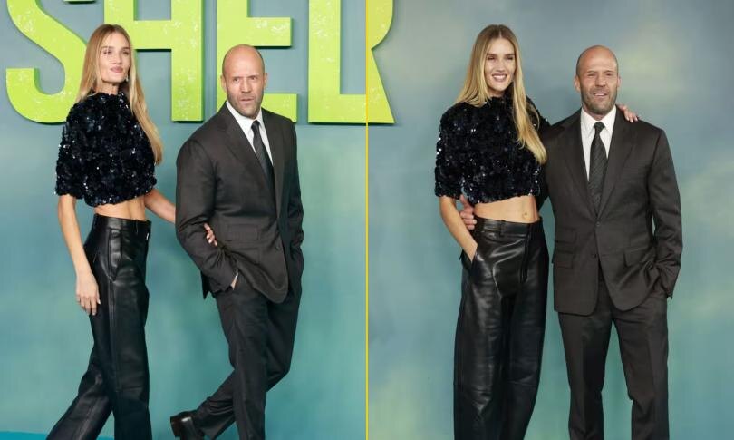    Источник: Getty Images | Рози Хантингтон-Уайтли демонстрирует свои мускулы рядом с Джейсоном Стэтхэмом