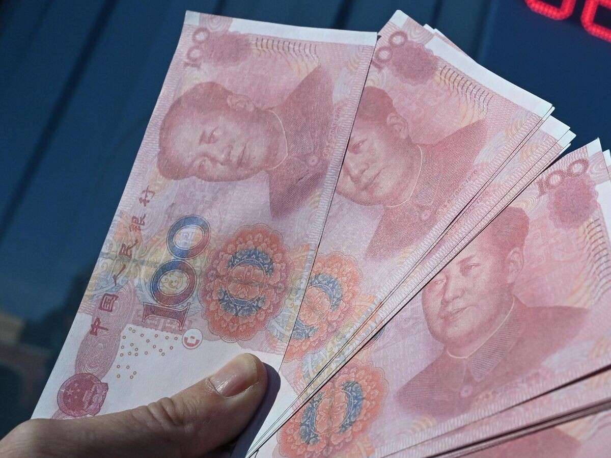    Китайские юани© РИА Новости . Илья Питалев