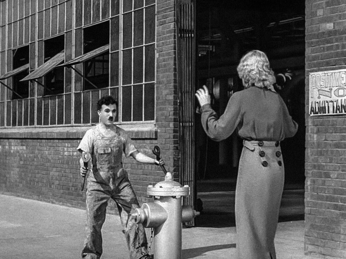 Кадр из фильма «Новые времена» (реж. Чарли Чаплин, 1936)
Рабочий не видит ничего за пределами конвейера