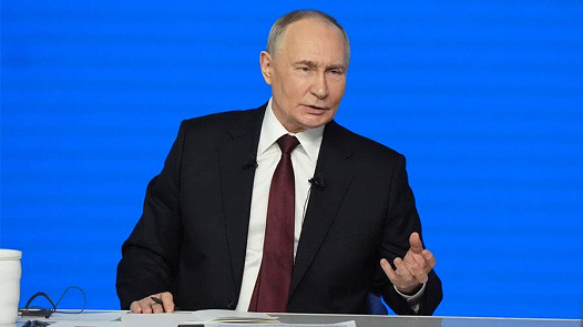   Фото: en.iz.ru ; Президент РФ Владимир Путин Анна Бурлакова