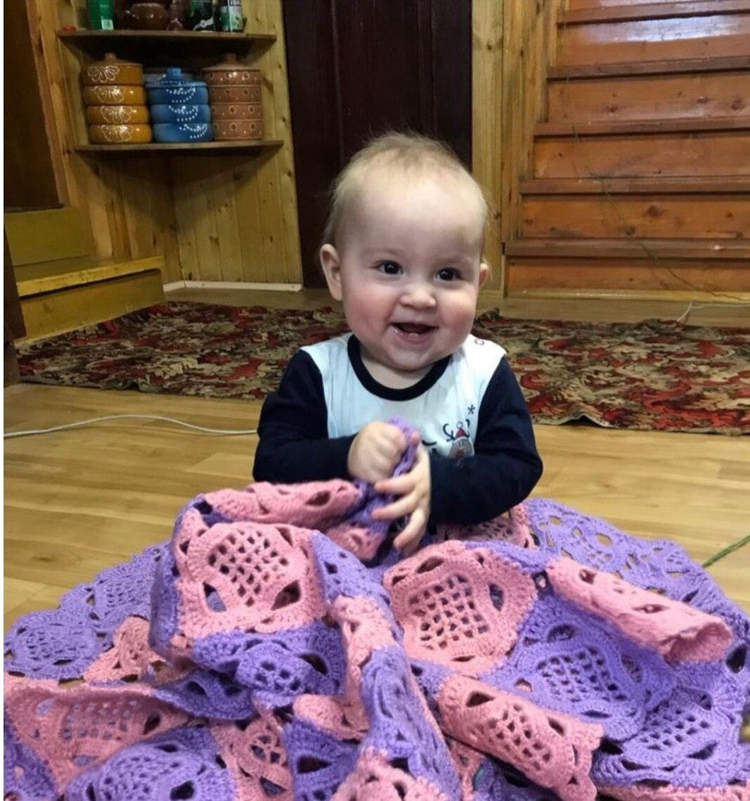 Мой маленький правнук, который уже пошёл в школу и плед для внучки.