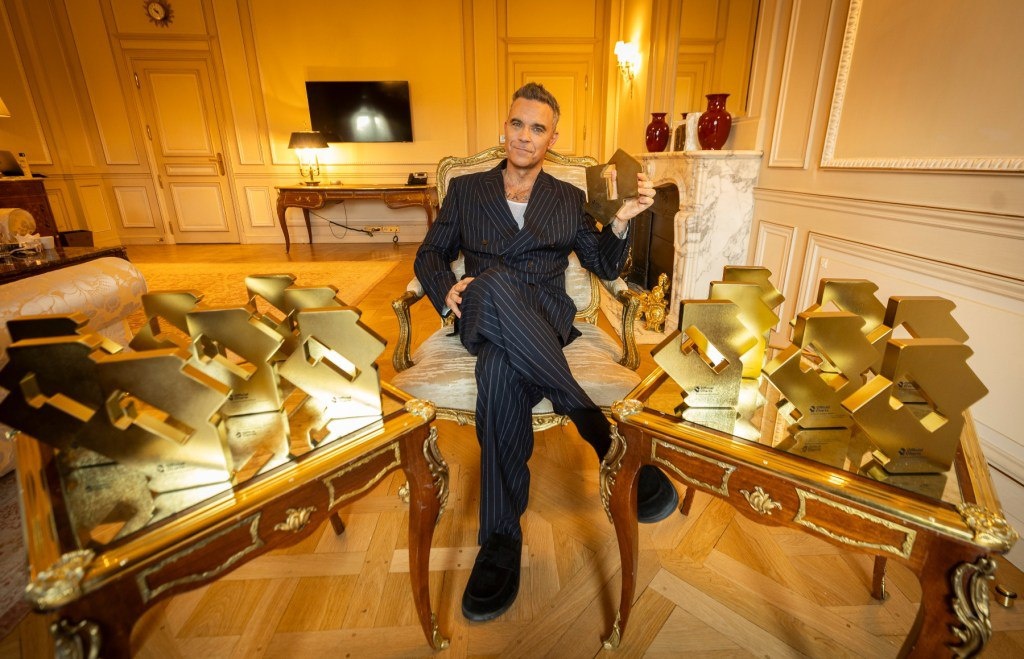    Робби Уильямс обогнал The ​​Beatles по числу альбомов, возглавивших британские хит-парады (фото 1)