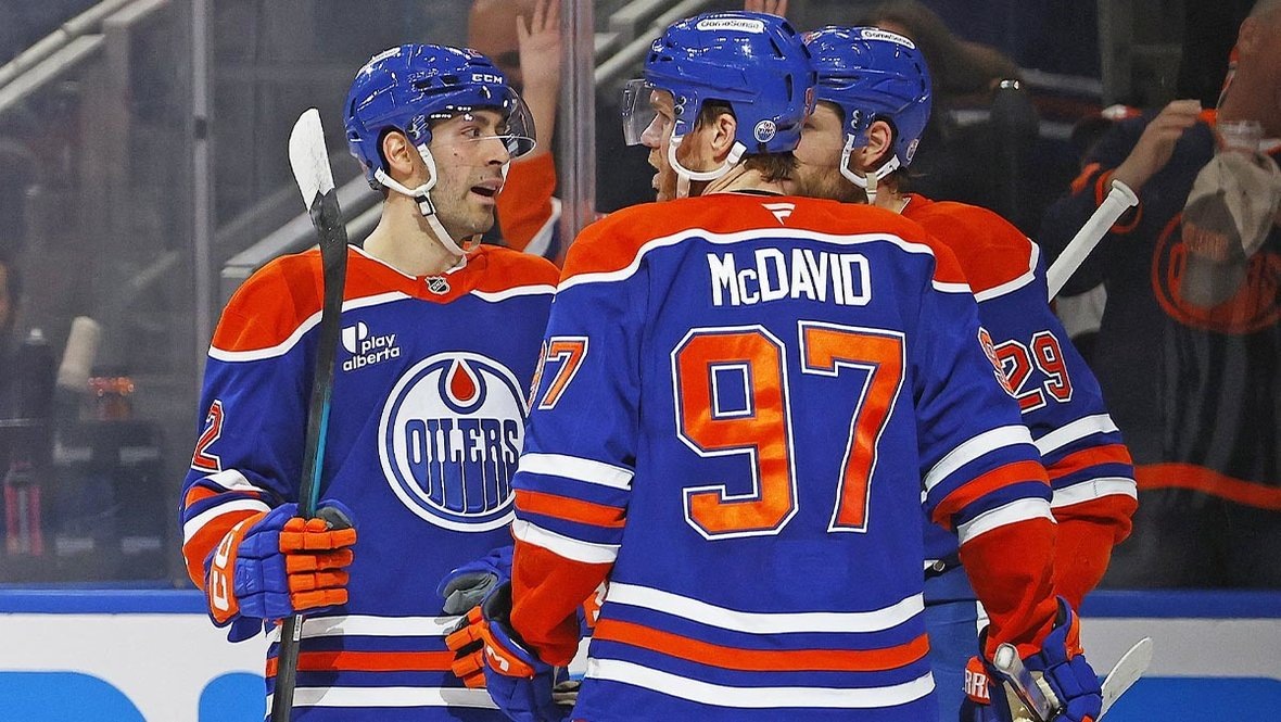    Эван Бушар, Коннор Макдэвид и Леон Драйзайтль.Imagn Images USA Today Sports