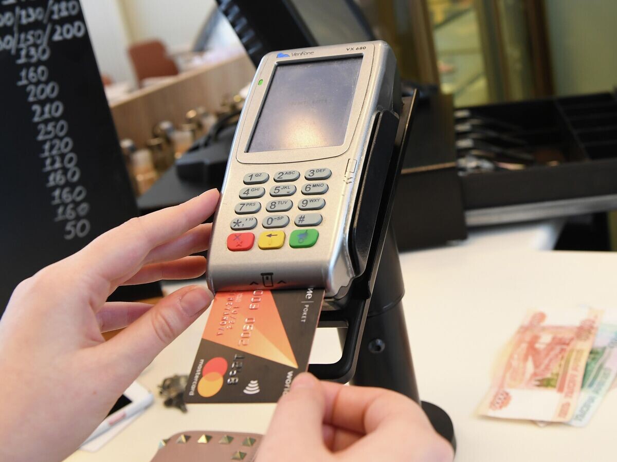    Терминал оплаты банковскими картами | © РИА Новости / Екатерина Чеснокова