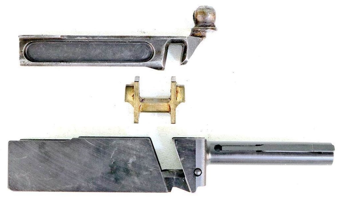 Замок Блиша в затворе пистолета-пулемета.