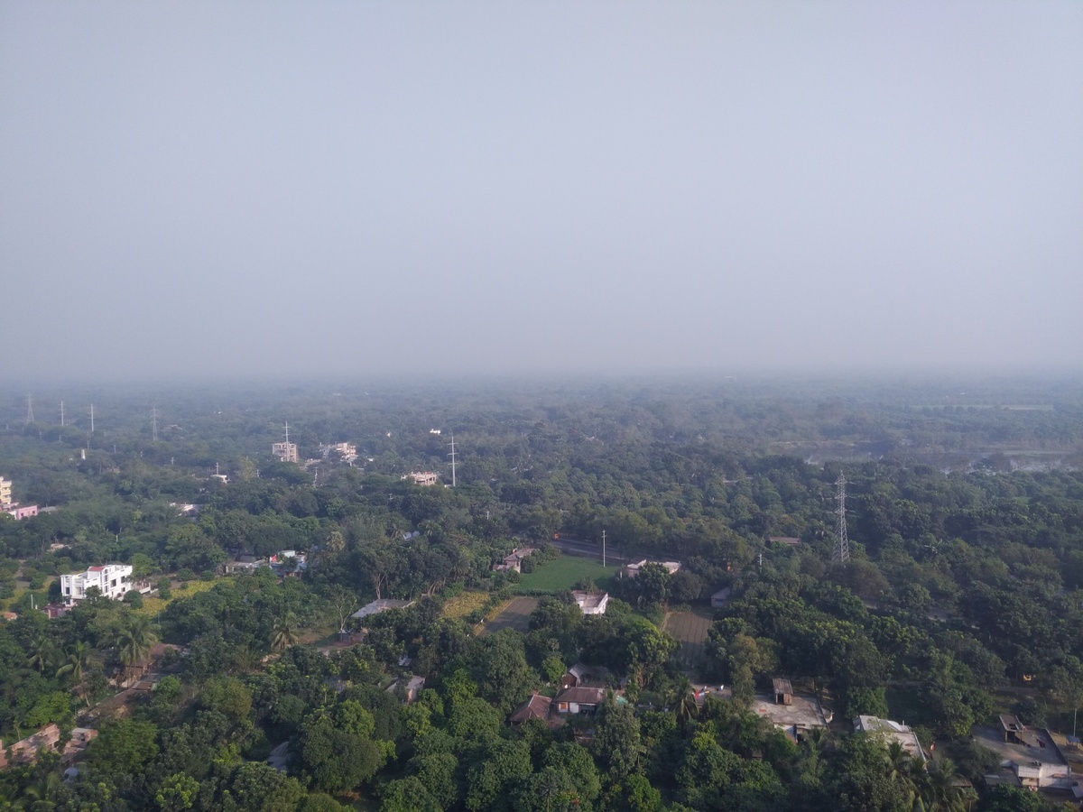 А что если там, за гороизоном лучше? Вид с крыши здания в Грин Сити, Бангладеш