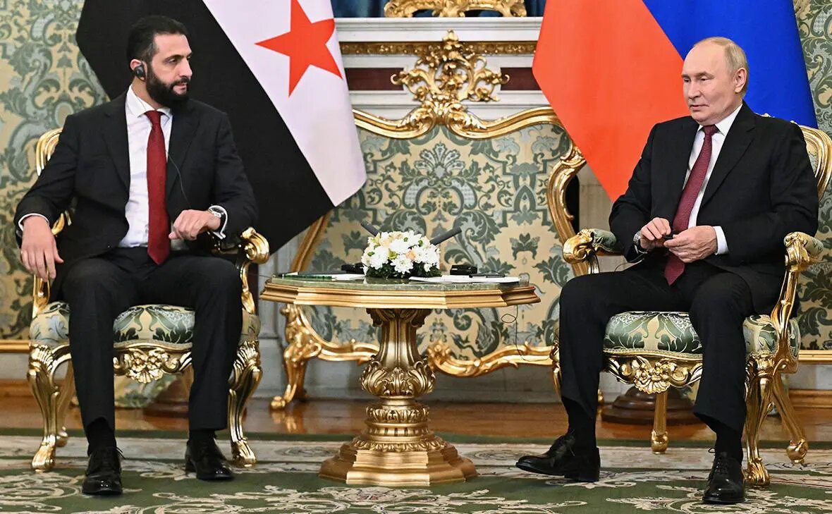    Ахмед аш-Шараа и Владимир Путин Фото: Сергей Бобылев / РИА Новости Богдан Жуков