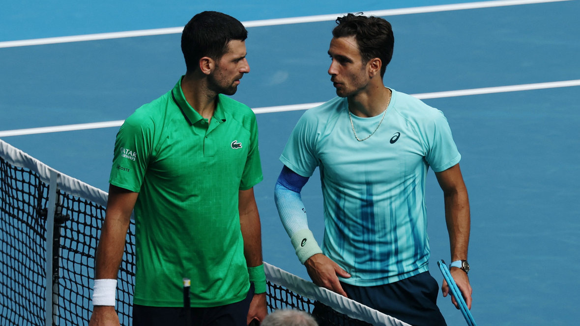    Новак Джокович и Лоренцо Музетти. Reuters
