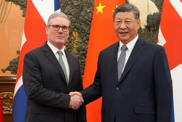 Carl Court/Pool via REUTERS