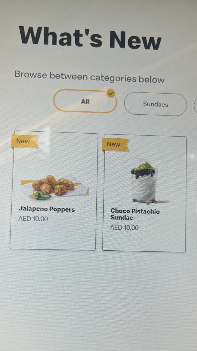 Новинки и их цены. Фото с терминала заказа макдональдса.