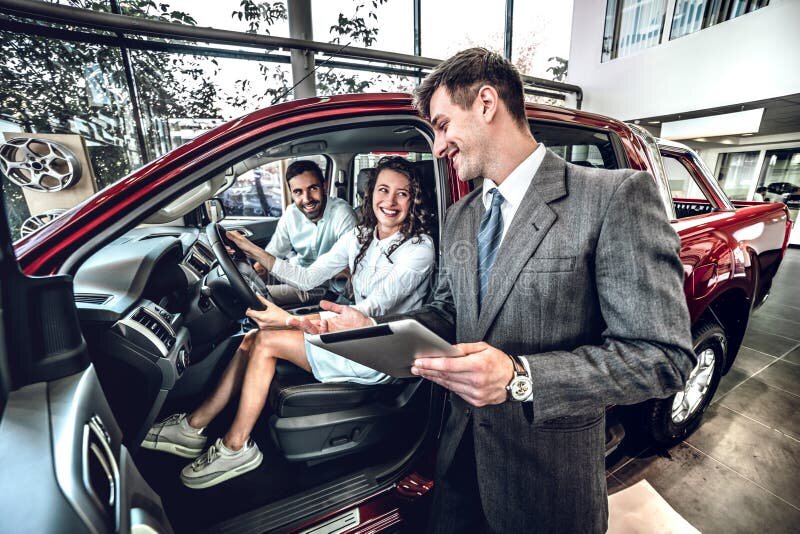 Lucky Family Sitting in New Automobile in Auto Salon Stock Image ...