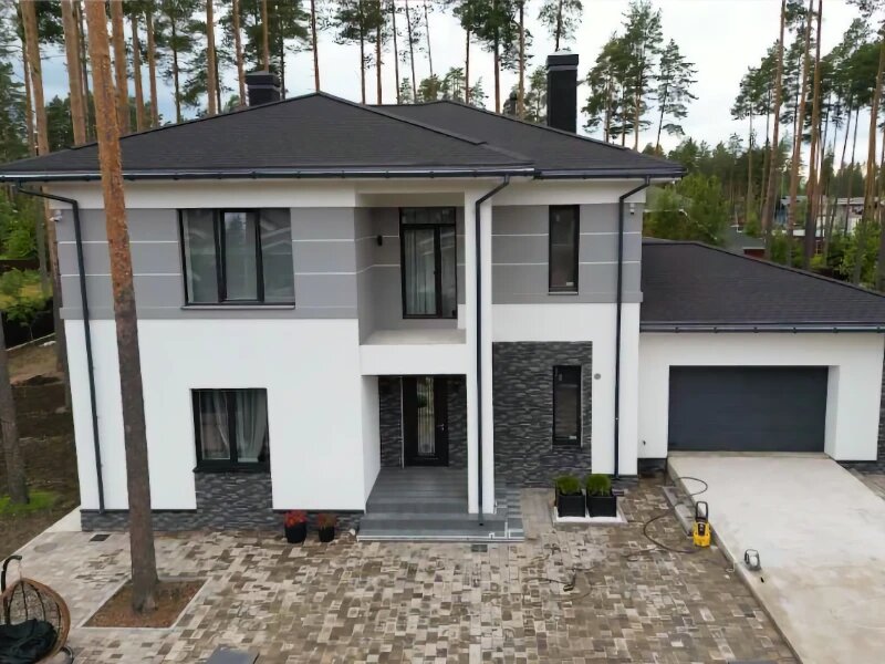 Дом, отделанный по технологии "мокрый фасад"