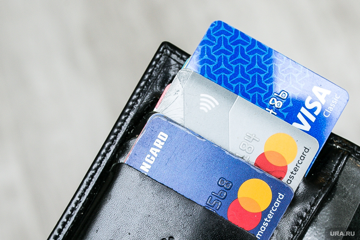 Часть карт этих платежных систем в России могут заблокировать. Фото: Денис Моргунов © URA.RU