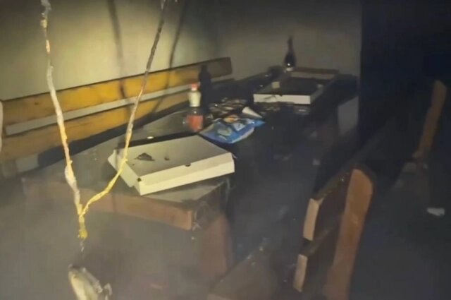    В верхнем правом углу видна бутылка. Фото: Скриншот из видео/ МЧС России по Кемеровской области — Кузбассу