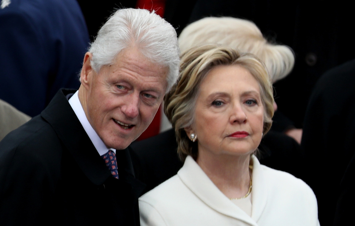    Билл Клинтон и Хиллари Клинтон  Joe Raedle/Getty Images