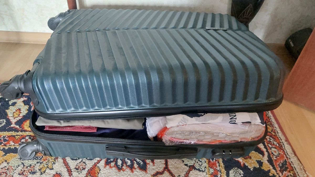 Чемодан в стадии загрузки