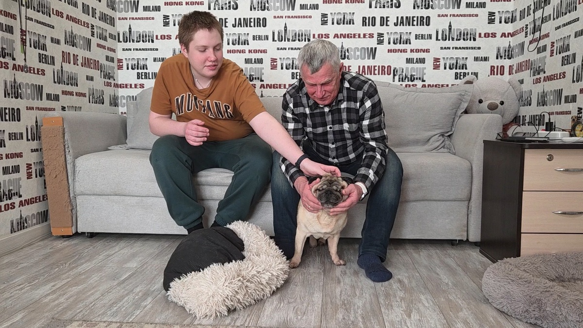 Владимир и Ефим Игошины всместе со своим питомцем