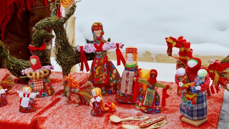    Russia, Karelia June 18 2017. Russian Maslenitsa small dolls in traditional dresses. This is traditional Russian culture handmade art. There was shooting at art fest in Karelia ( Russian North-west) on the "Festival of sleepy villages".
