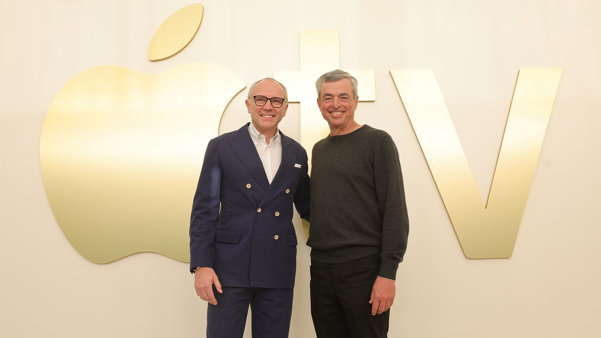 Стефано Доменикали и старшим вице-президент Apple по обслуживанию Эдди Кью. formula1.com