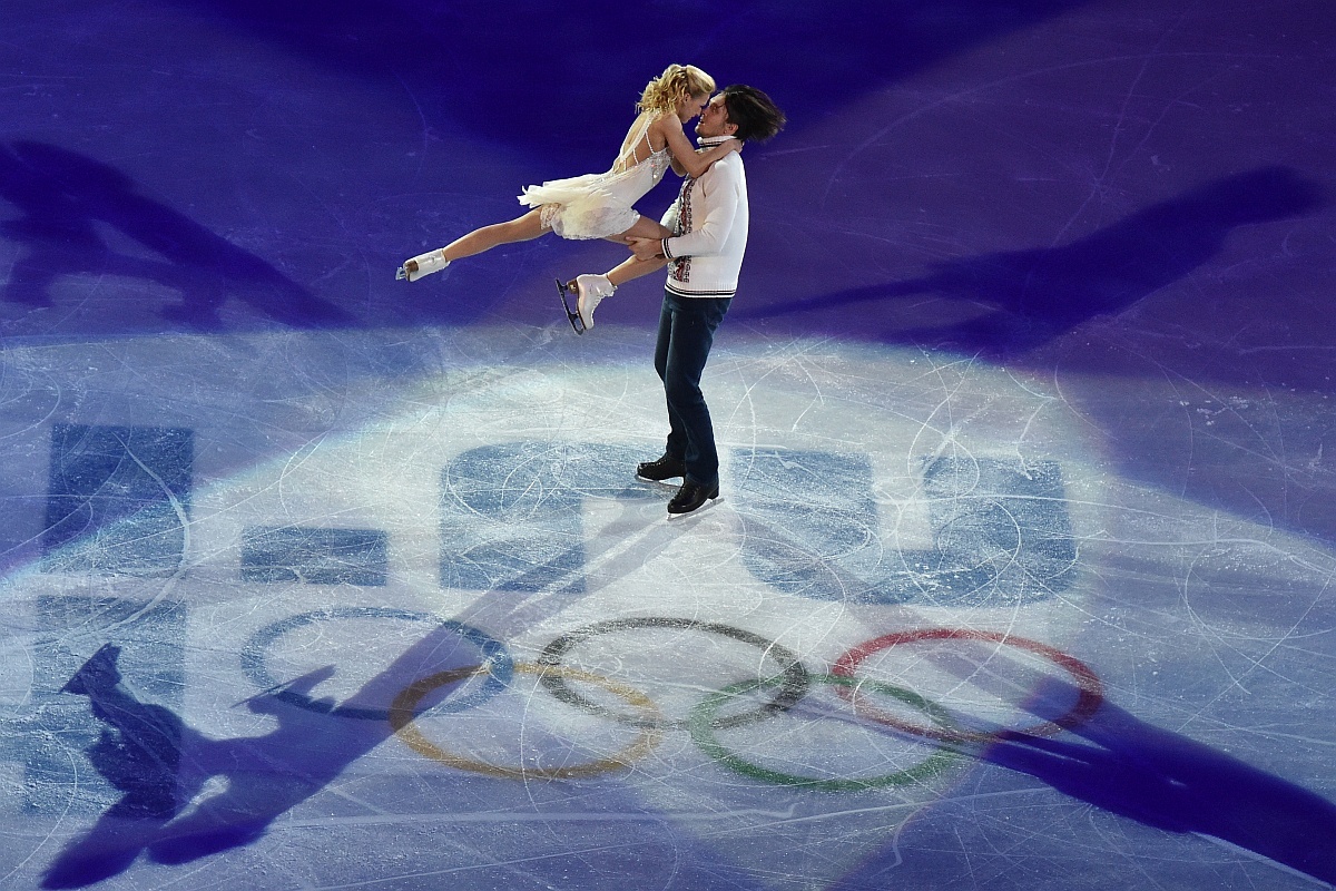    Татьяна Волосожар и Максим Траньков во время показательного выступления на XXII зимних Олимпийских играх в Сочи. / Александр Вильф/РИА Новости