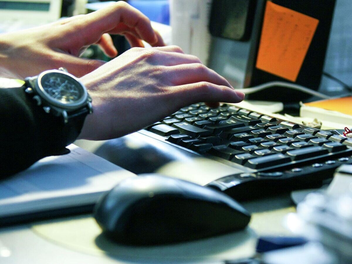    Работа за компьютером© РИА Новости . Руслан Кривобок