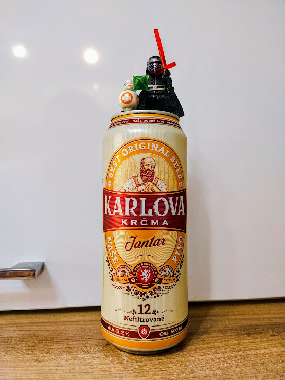 Банка бежевого цвета, все с тем же лысеющим бородачом)))