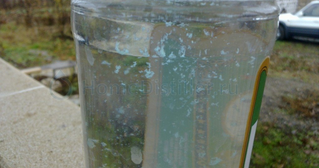 Белые хлопья и осадок в самогоне: причины и способы спасения