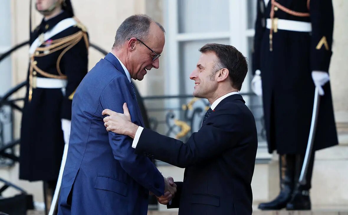    Фридрих Мерц и Эмманюэль Макрон Фото: Tom Nicholson / Getty Images Полина Белоусова