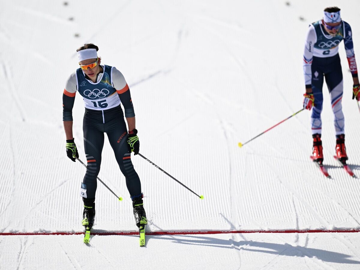    Российский спортсмен Савелий Коростелев на финише скиатлона 10км + 10км соревнований по лыжным гонкам среди мужчин зимних Олимпийских игр 2026 | © РИА Новости