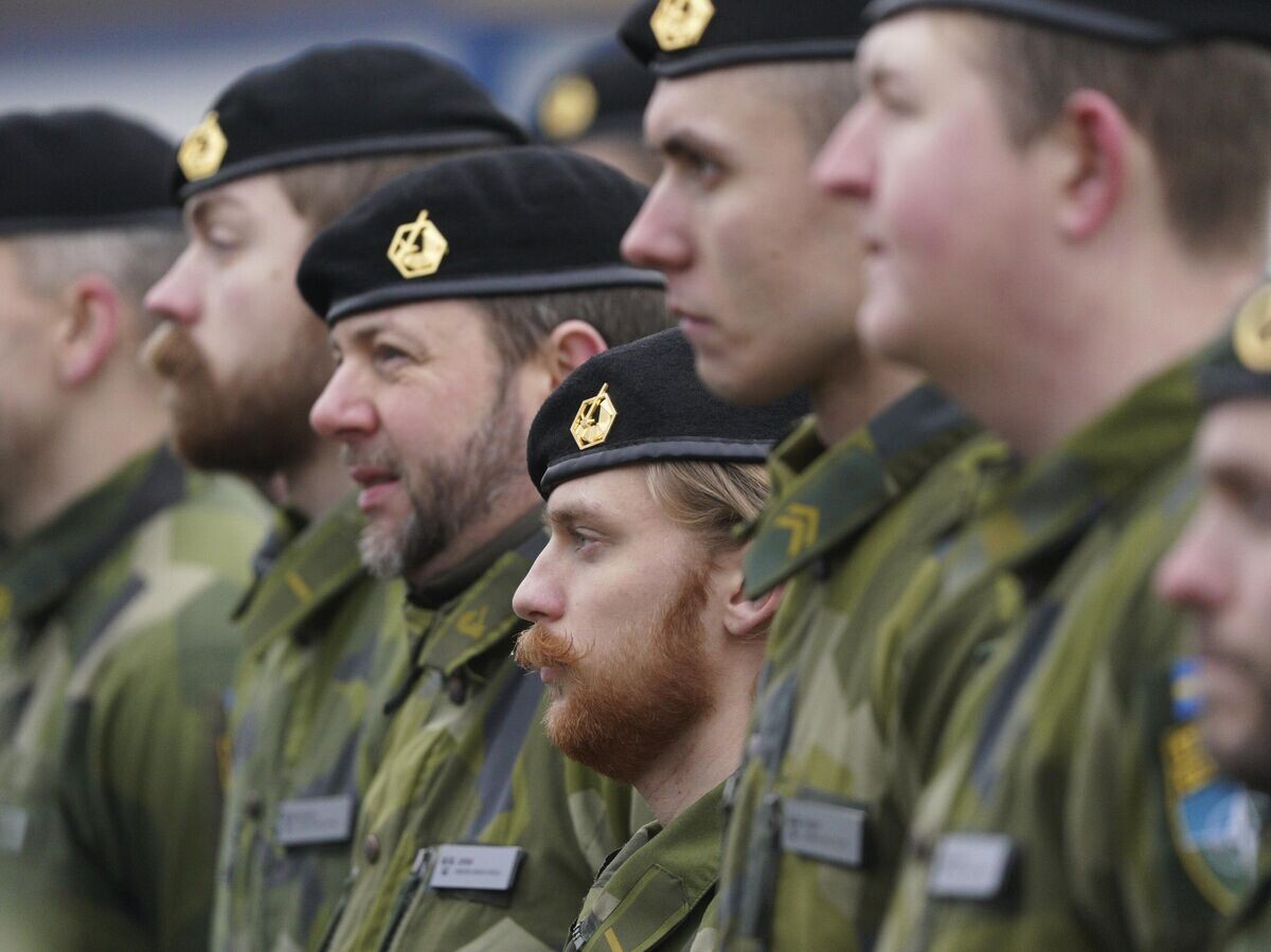   Шведские военнослужащие | © AP Photo / Roman Koksarov