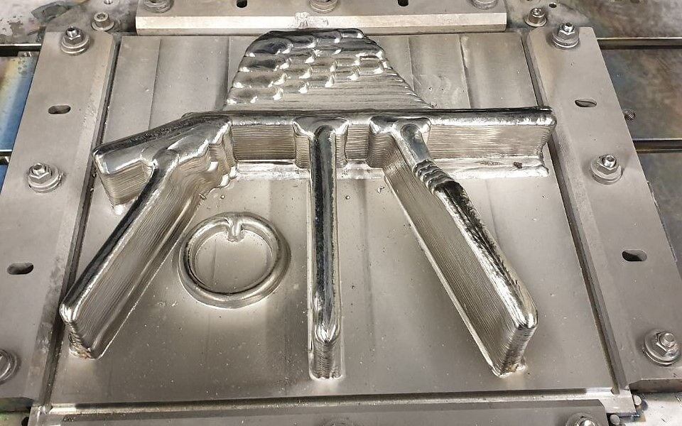 Детали, изготовленные по технологии w‑DED, в зоне обрамления грузовой двери A350. Фото: Airbus.